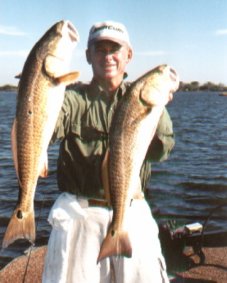 Man Holding Fish 1